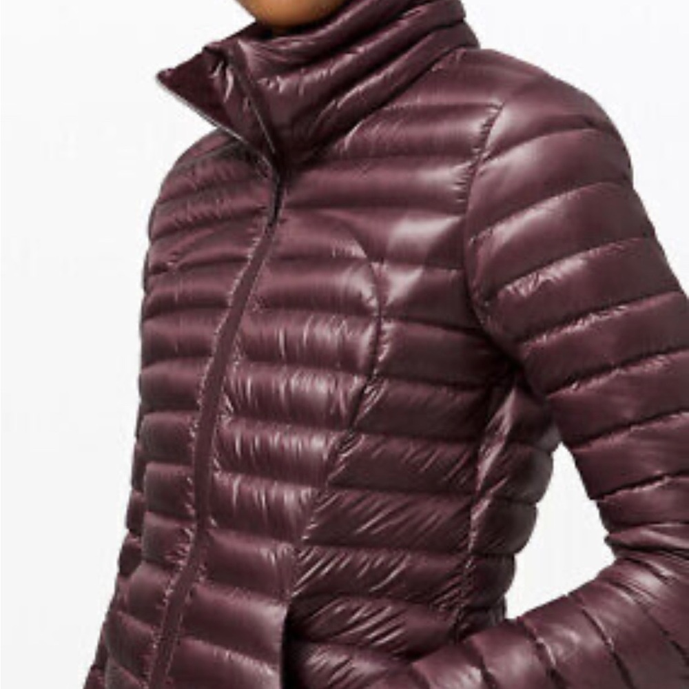 Lululemon Pack it down jacket size 4. slight stain on front, but not visible.